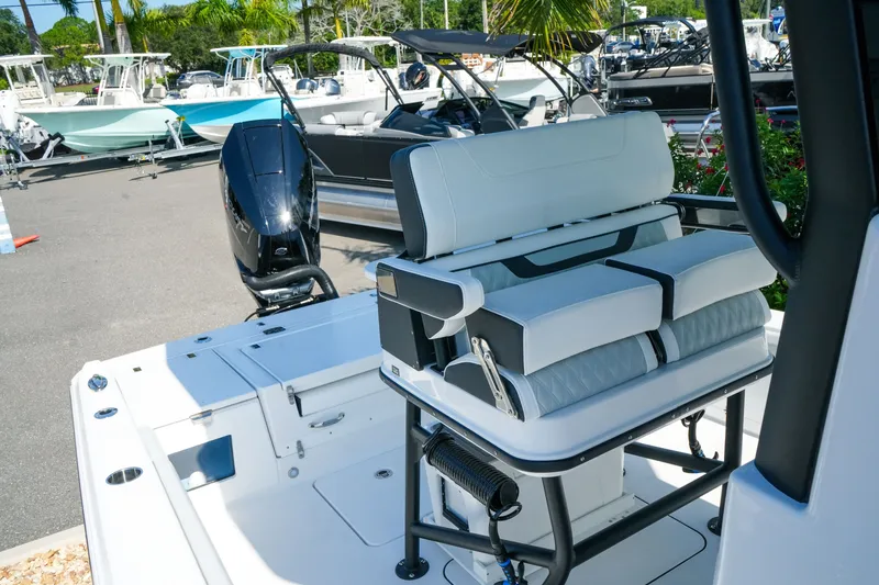 Slide: The Image of 2027 Blackfin 262 HB boat interior with sleek seating and modern design. - 27