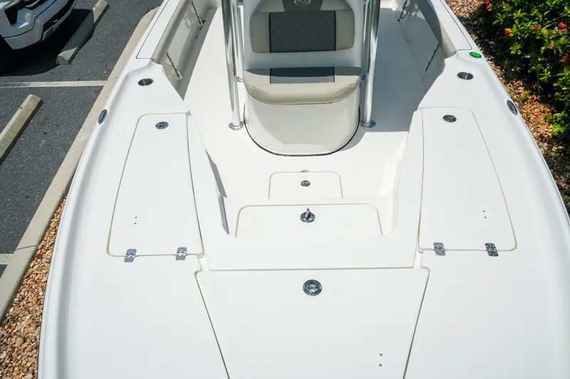 Slide: The Image of 2027 Key West 230 Bay Reef boat deck with seating and storage compartments. - 22