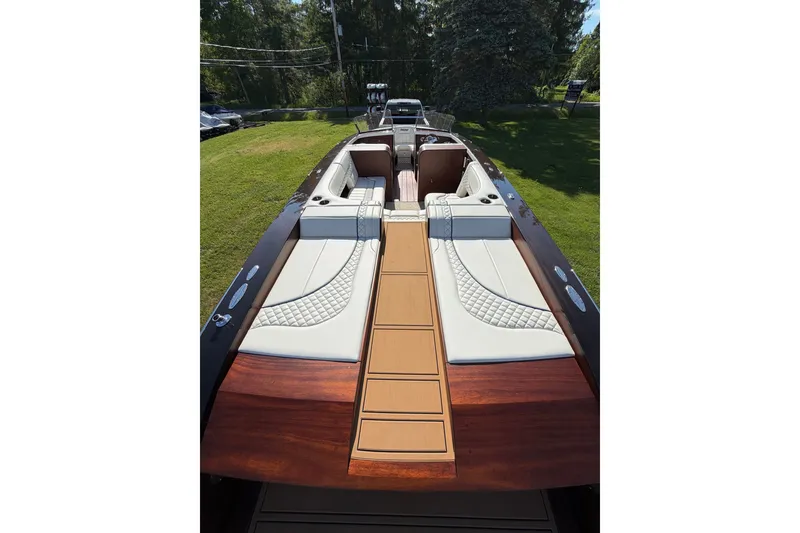 Slide: The Image of 2025 StanCraft 260 Day Boat with luxurious seating and elegant wood finish. - 32