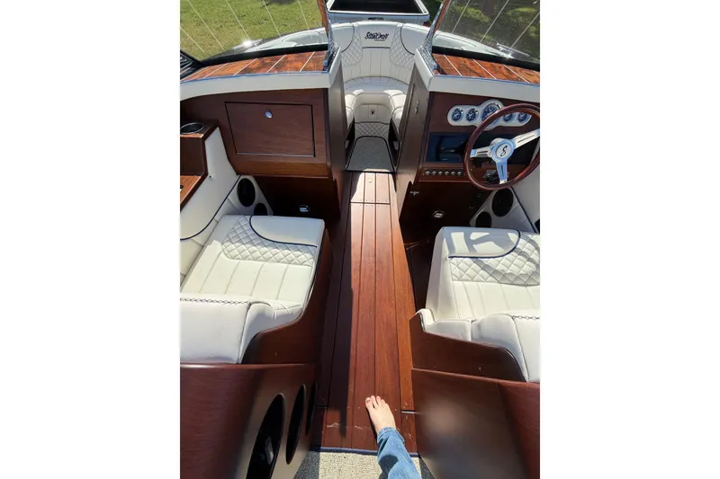 Slide: The Image of Interior of 2025 StanCraft 260 Day Boat with luxurious wood and leather seating. - 39