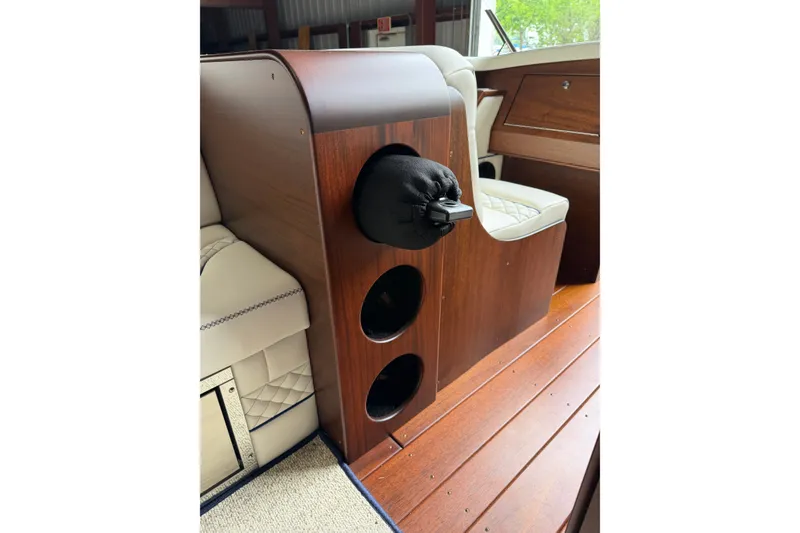 Slide: The Image of Interior of 2025 StanCraft 260 Day Boat with elegant wood and leather seating. - 21
