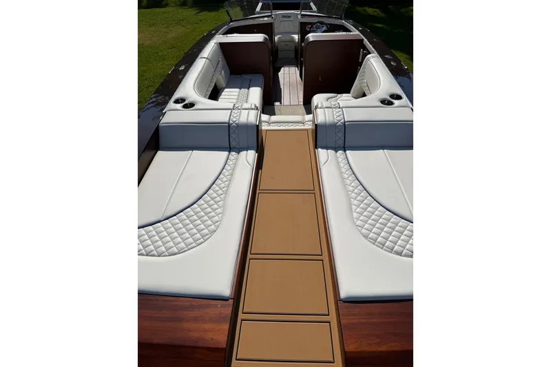 Slide: The Image of Luxurious 2025 StanCraft 260 Day Boat interior with elegant seating and wood accents. - 31