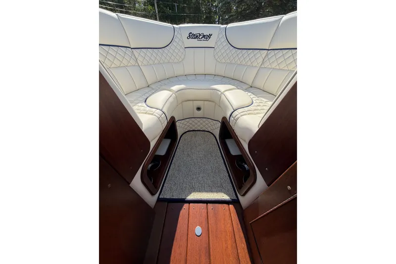 Slide: The Image of Luxurious interior of 2025 StanCraft 260 Day Boat with elegant seating and wood accents. - 40