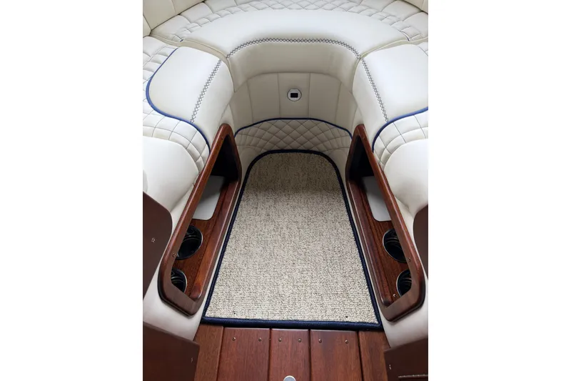 Slide: The Image of Luxurious interior of 2025 StanCraft 260 Day Boat with plush seating and elegant wood accents. - 15