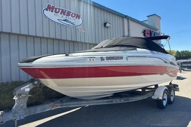 Slide: The Image of 2004 Sea Ray 200 Sundeck boat on trailer at Munson Ski & Marine dealership. - 1