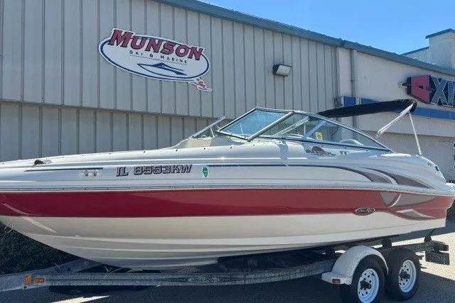 Slide: The Image of 2004 Sea Ray 200 Sundeck boat on trailer outside Munson Ski & Marine. - 4
