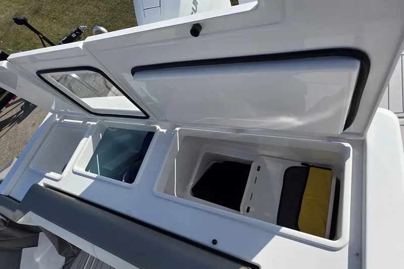 Slide: The Image of 2024 Tiara Sport 34LS boat storage compartments, open and spacious for gear organization. - 15