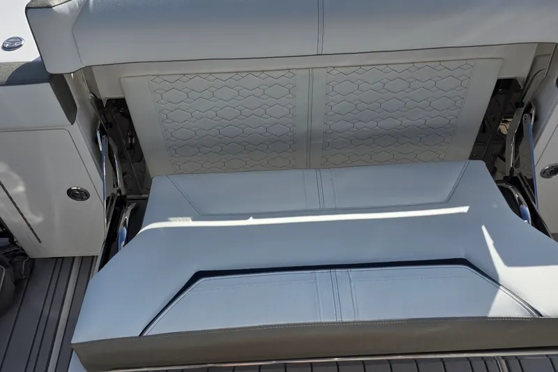 Slide: The Image of 2024 Tiara Sport 34LS boat seat with elegant stitching and modern design. - 14