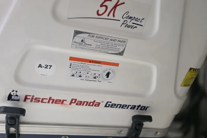 Slide: The Image of Fischer Panda generator on 2024 Tiara Sport 34LS, featuring 5K Compact Power label. - 35