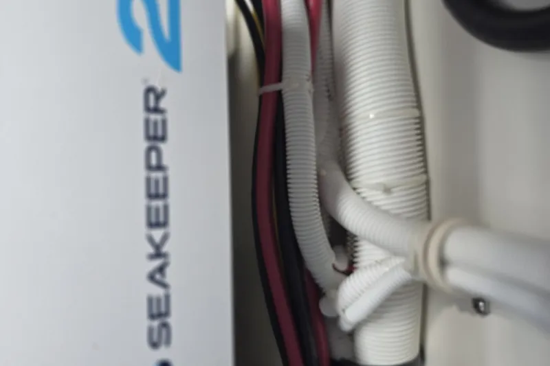 Slide: The Image of Close-up of Seakeeper 2 system wiring in 2024 Tiara Sport 34LS boat. - 38