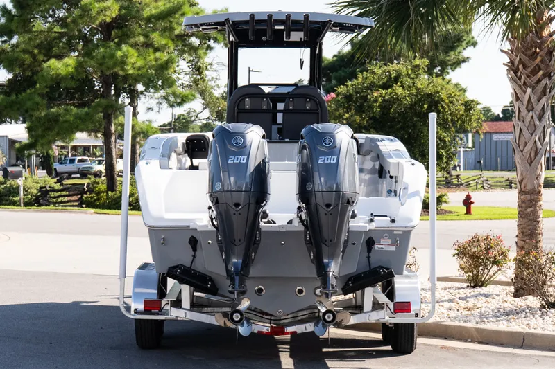 Slide: The Image of 2027 Sea Pro 262 Offshore boat with dual 200 horsepower engines on a trailer. - 5