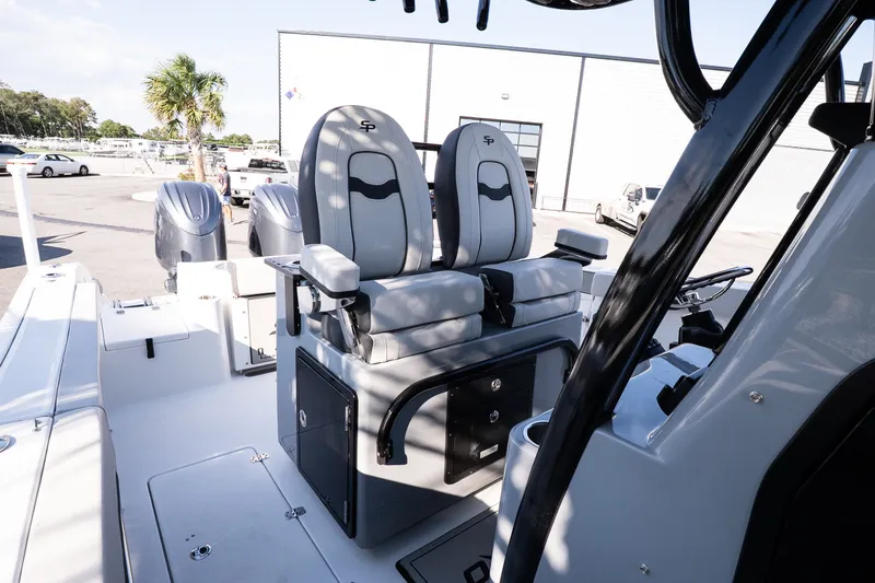 Slide: The Image of 2027 Sea Pro 262 Offshore boat interior with dual seats and modern design. - 16