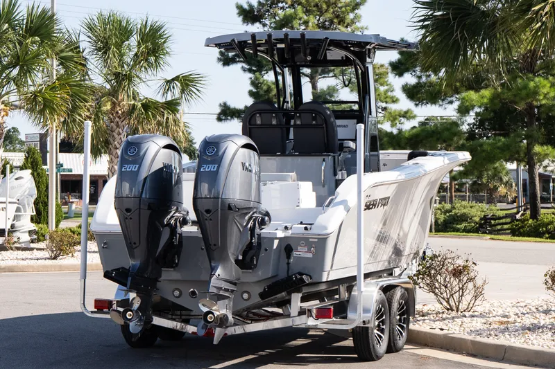 Slide: The Image of 2027 Sea Pro 262 Offshore boat with dual Yamaha engines on a trailer. - 6