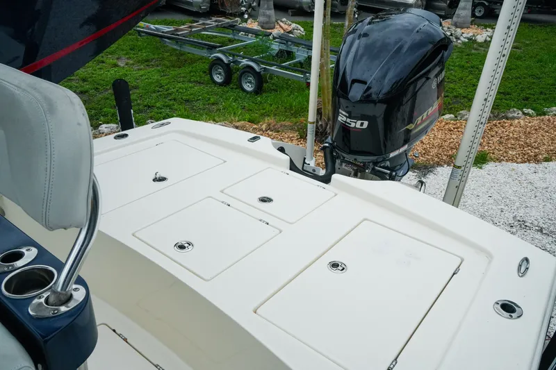 Slide: The Image of 2021 Pathfinder 2300 HPS boat with Yamaha 250 engine, featuring spacious deck and seating. - 23