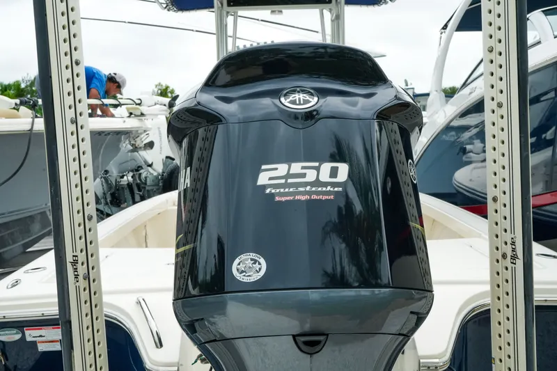 Slide: The Image of 2021 Pathfinder 2300 HPS boat with Yamaha 250 four-stroke engine at marina. - 6