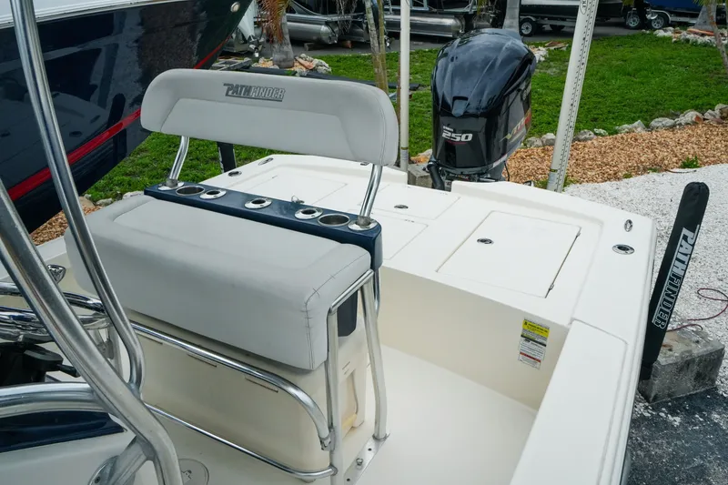 Slide: The Image of 2021 Pathfinder 2300 HPS boat with Yamaha 250 engine, featuring seating and rod holders. - 22
