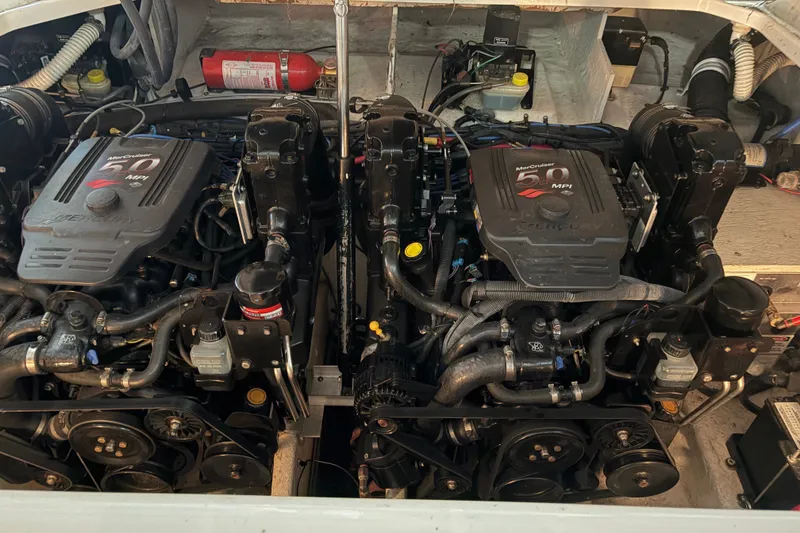Slide: The Image of Engine compartment of a 2006 Sea Ray 290 Sundancer with twin MerCruiser 5.0 MPI engines. - 29
