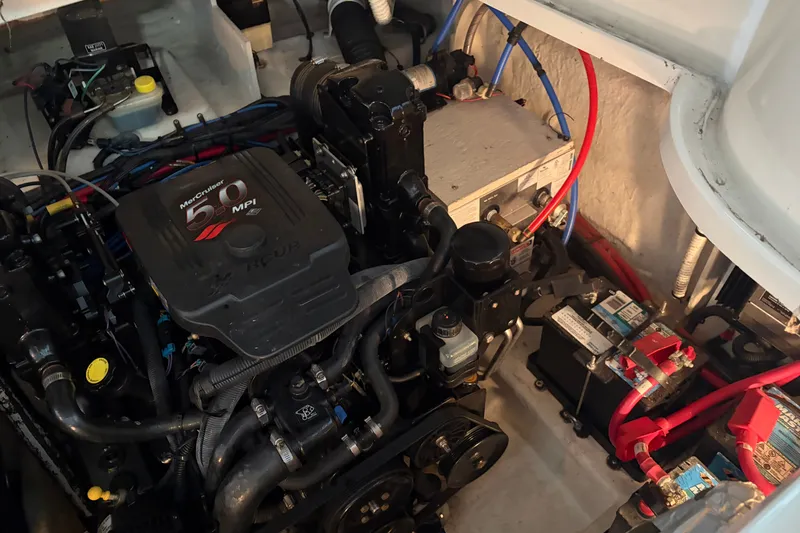Slide: The Image of Engine compartment of a 2006 Sea Ray 290 Sundancer with MerCruiser 5.0 MPI engine. - 26