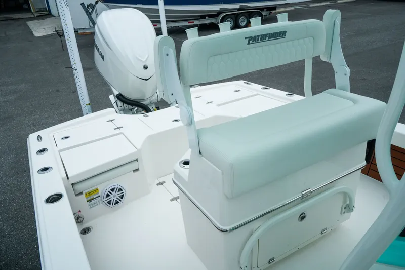 Slide: The Image of 2027 Pathfinder 2500 Tournament boat interior with seating and Yamaha outboard motor. - 34