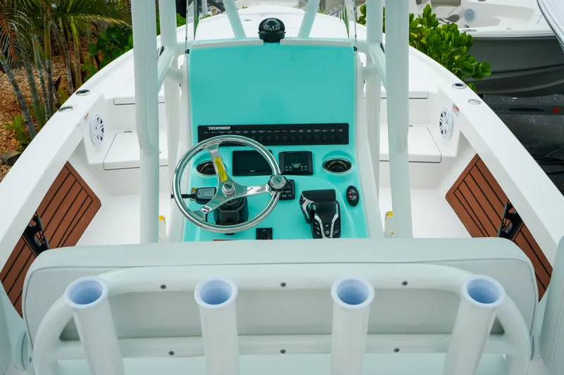 Slide: The Image of Interior view of 2027 Pathfinder 2500 Tournament boat with modern steering console. - 15