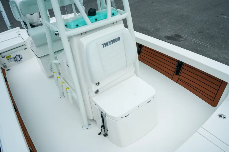 Slide: The Image of 2027 Pathfinder 2500 Tournament boat interior with seating and storage compartments. - 31