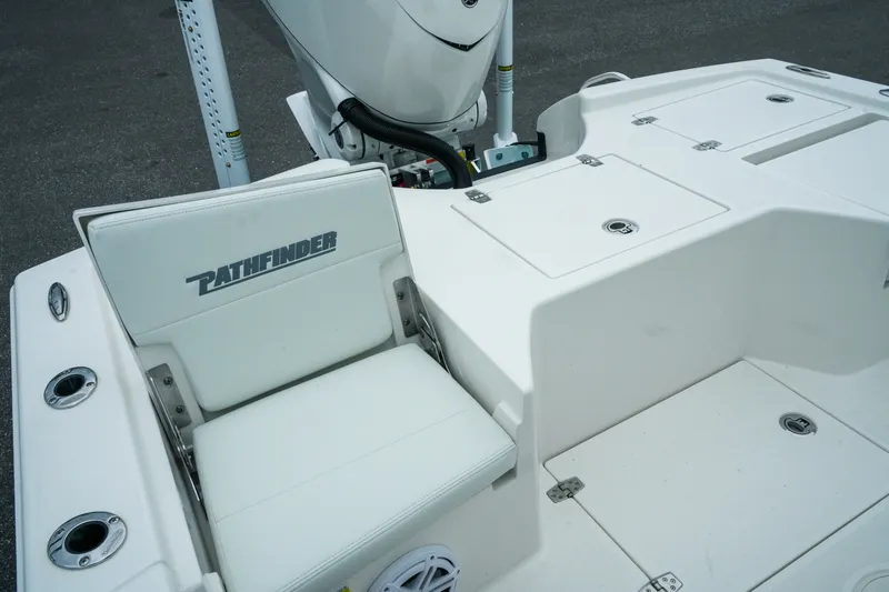 Slide: The Image of 2027 Pathfinder 2500 Tournament boat interior with seating and storage compartments. - 37