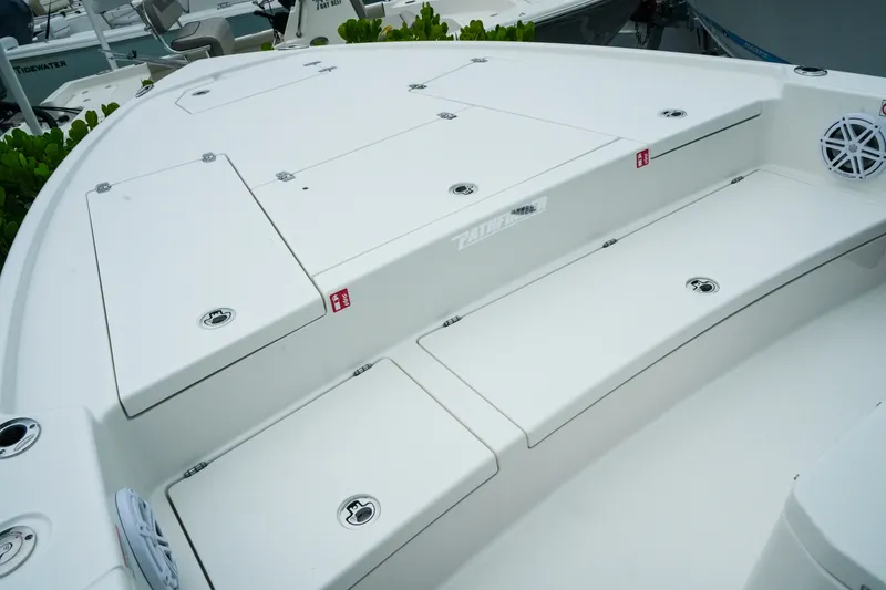 Slide: The Image of 2027 Pathfinder 2500 Tournament boat deck with storage compartments and speaker. - 23