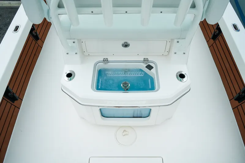 Slide: The Image of 2027 Pathfinder 2500 Tournament boat interior with livewell and seating area. - 16