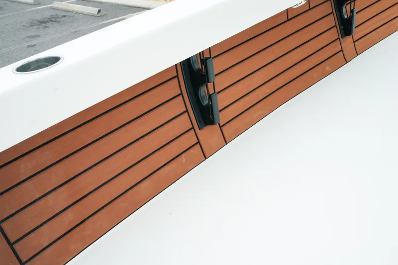Slide: The Image of Pathfinder 2500 Tournament 2027 boat interior with sleek wood paneling and modern design. - 17