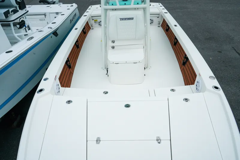 Slide: The Image of 2027 Pathfinder 2500 Tournament boat interior with seating and storage compartments. - 27