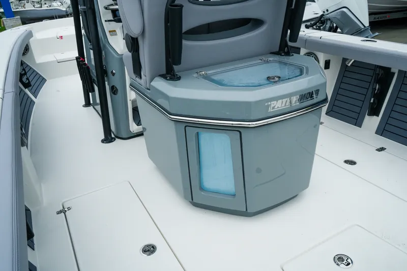 Slide: The Image of 2027 Pathfinder 2700 Tournament boat interior with seating and storage features. - 16
