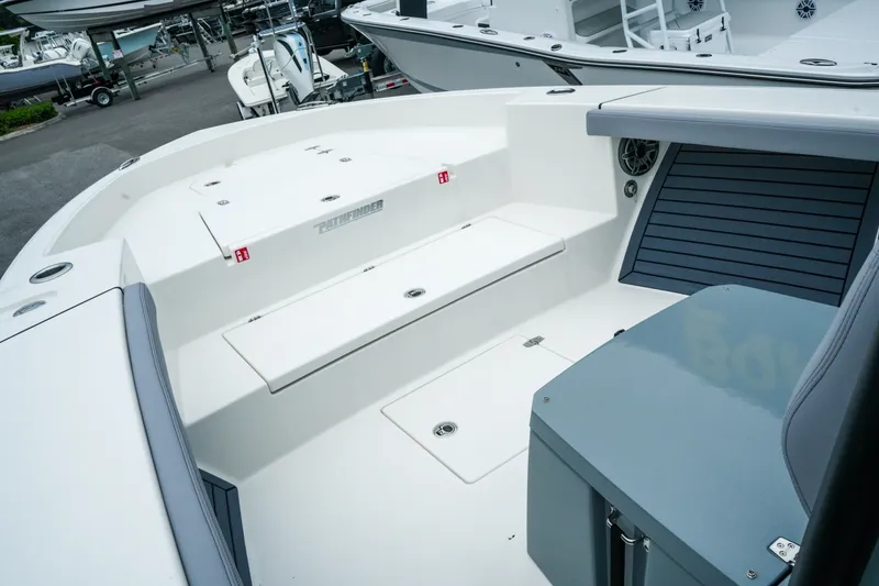 Slide: The Image of 2027 Pathfinder 2700 Tournament boat interior with seating and storage compartments. - 29