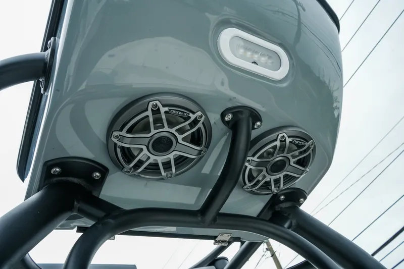 Slide: The Image of Speakers and light on 2027 Pathfinder 2700 Tournament boat's underside, showcasing marine audio setup. - 38