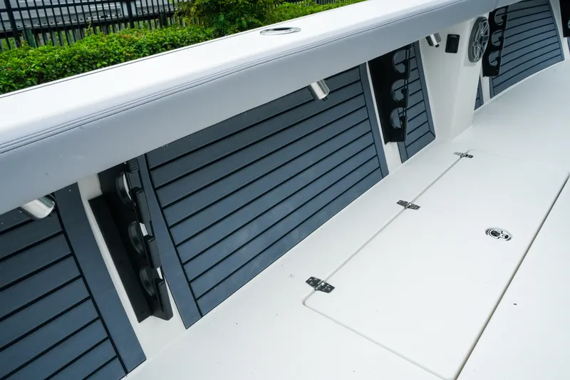 Slide: The Image of Interior view of 2027 Pathfinder 2700 Tournament boat, featuring sleek storage compartments. - 21