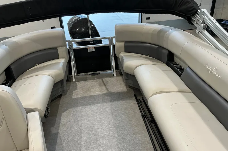 Slide: The Image of Interior of 2021 SunChaser Vista 20 LR pontoon boat with plush seating and cup holders. - 15