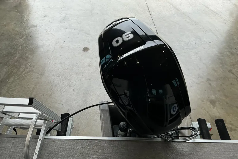 Slide: The Image of Outboard motor on a 2021 SunChaser Vista 20 LR boat, viewed from above. - 21