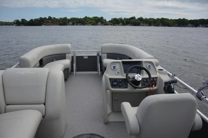 The Image of Manufacturer Provided Image: 2021 SunChaser Vista 20 LR pontoon boat interior on a lake. - 0