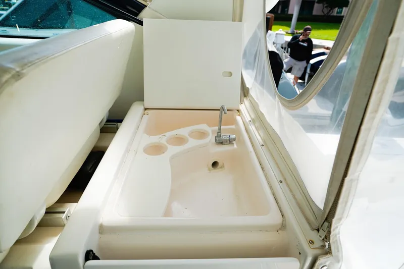 Slide: The Image of 2005 Tiara Yachts 3800 Open sink area with cup holders and faucet. - 19