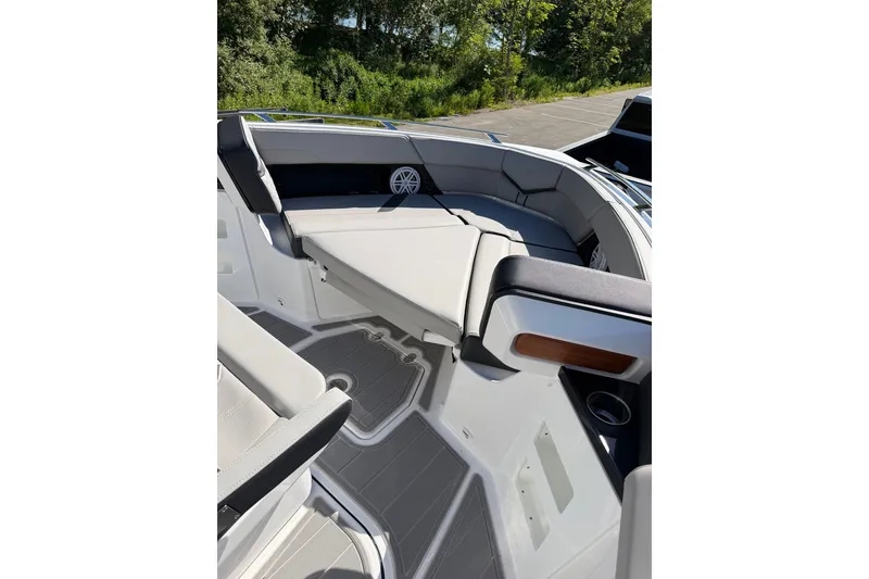 Slide: The Image of 2027 Monterey Elite 30 OB boat interior with sleek seating and modern design. - 22
