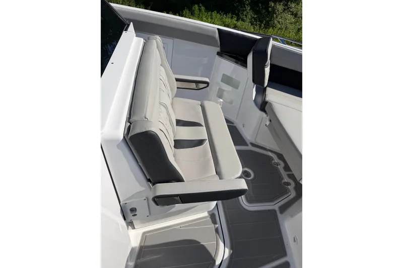 Slide: The Image of 2027 Monterey Elite 30 OB boat interior with gray seating and sleek design. - 21