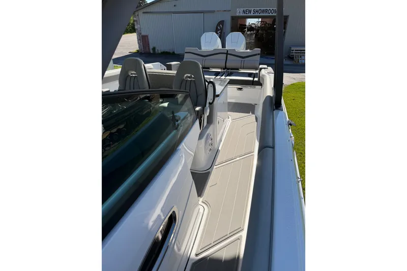 Slide: The Image of 2027 Monterey Elite 30 OB boat interior with sleek seating and modern design. - 18