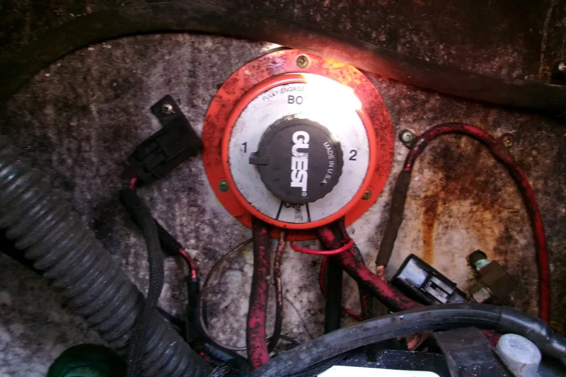 Slide: The Image of Battery switch and wiring inside a 2000 Grady-White Escape 209 boat. - 8