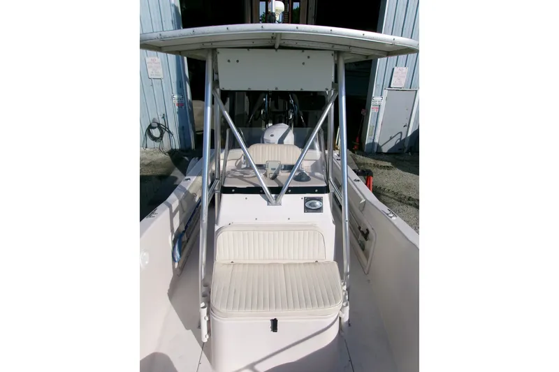 Slide: The Image of 2000 Grady-White Escape 209 boat interior with seating and console. - 38