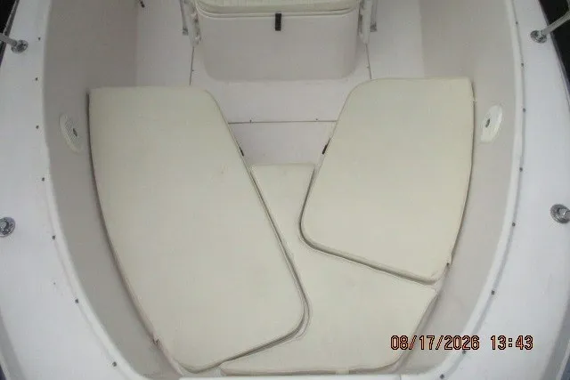 Slide: The Image of Grady-White Escape 209 boat interior seating, 2000 model, white cushions. - 27