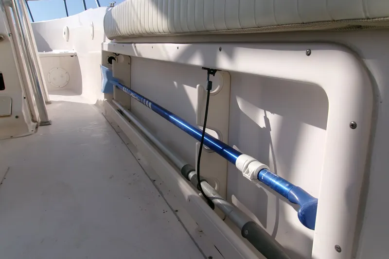 Slide: The Image of Interior view of a 2000 Grady-White Escape 209 boat, featuring storage compartments. - 50