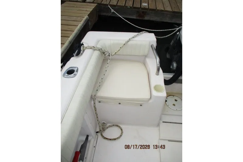 Slide: The Image of Grady-White Escape 209 boat interior with seating and dock, 2000 model. - 34
