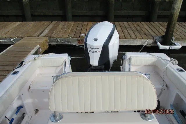 Slide: The Image of 2000 Grady-White Escape 209 boat with Evinrude 200 HP engine at dock. - 61