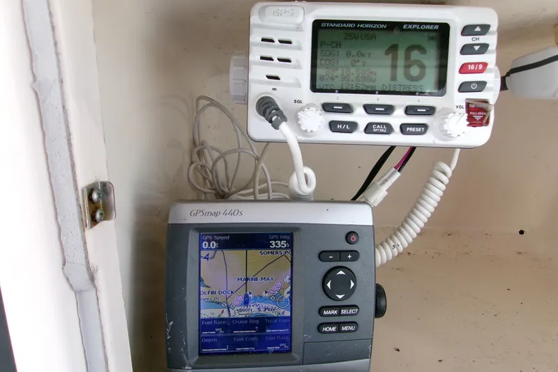 Slide: The Image of GPS and radio equipment on a 2000 Grady-White Escape 209 boat. - 28
