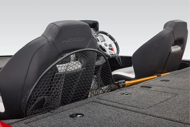 Slide: The Image of 2027 Nitro Z19 XL boat interior with fishing net and steering wheel. - 14