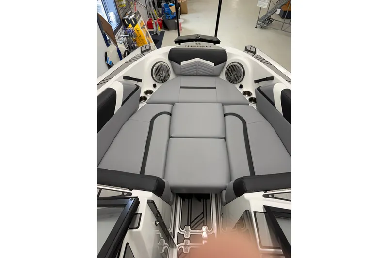 Slide: The Image of Interior of 2026 Varatti Z2373 boat with gray cushioned seating and speakers. - 7